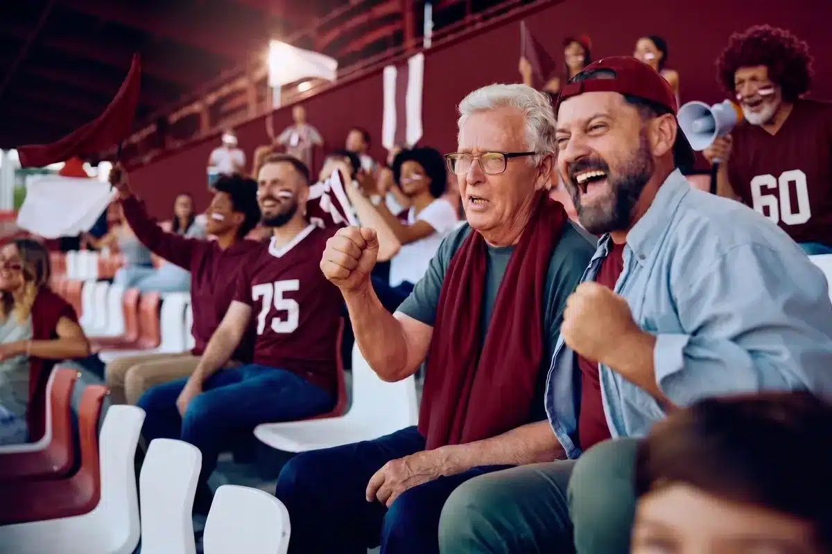 Seniors watching a sporting game